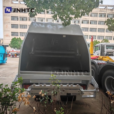 HOWO कचरा ट्रक कम्पैक्टर 4x2 यूरो 2 कचरा निपटान कचरा रियर लोडर ट्रक ग्रीन डीजल मॉडल नया