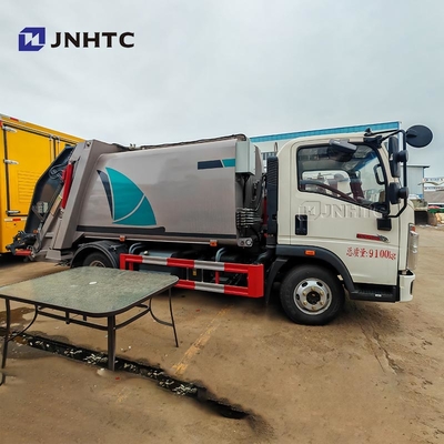 HOWO कचरा ट्रक 4X2 5CBM 105CBM कचरा कंपेक्टर कचरा ट्रक