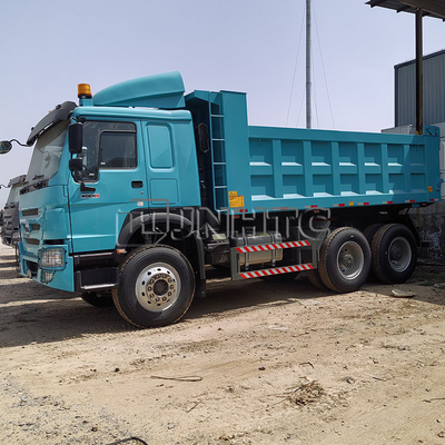 नई स्टॉक सिनोट्रक HOWO डंप ट्रक बाएं मोड़ डिजाइन के साथ 20 टन क्षमता 6X4 10 पहियों के डंप ट्रक के साथ उपलब्ध