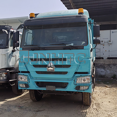 नई स्टॉक सिनोट्रक HOWO डंप ट्रक बाएं मोड़ डिजाइन के साथ 20 टन क्षमता 6X4 10 पहियों के डंप ट्रक के साथ उपलब्ध