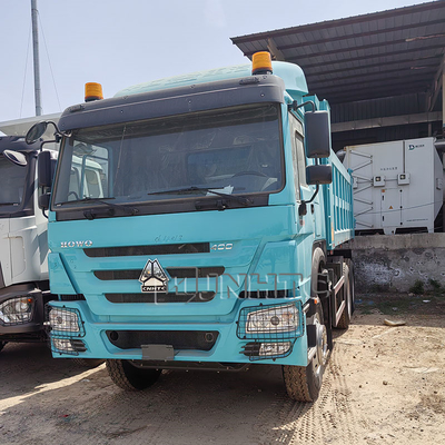 नई स्टॉक सिनोट्रक HOWO डंप ट्रक बाएं मोड़ डिजाइन के साथ 20 टन क्षमता 6X4 10 पहियों के डंप ट्रक के साथ उपलब्ध