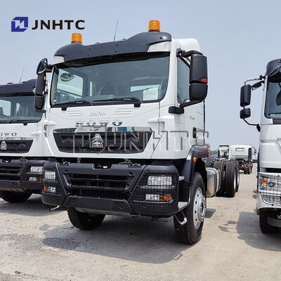 सस्ते सिनोट्रुक HOWO TX 6X4 रोलबैक फ्लैट बेड कार कैरियर कार्गो ट्रक चेसिस बिक्री के लिए