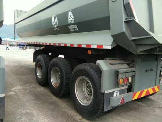 साइड गार्ड और इलेक्ट्रिकल ओपनिंग टॉप कवर के साथ Sinotruk Howo 40-60t सेमी डंप ट्रेलर