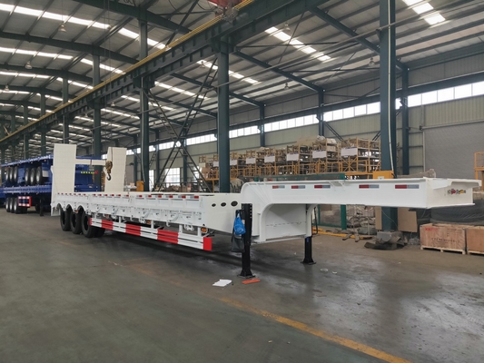 मैकेनिकल सस्पेंशन में Q235 स्टील 100T लो बेड हैवी ड्यूटी सेमी ट्रेलर्स