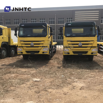 SINOTRUK Howo हैवी कार्गो ट्रक 35 टन फ्लैटबेड ट्रेलर ट्राई एक्सल फ्लैटबेड