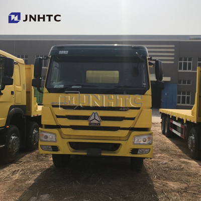 SINOTRUK 8 * 4 22-30 टन अवतल फ्लैटबेड परिवहन ट्रक खुदाई परिवहन ट्रक