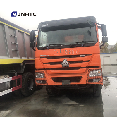 SINOTRUK 371 एचपी 8 × 4 डंप ट्रक भारी शुल्क डंप ट्रक 50 टन 28CBM लोड हो रहा है
